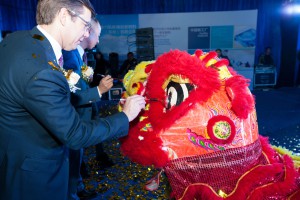 Oliver CEO Mike Benevento and Oliver GM Asia Brady Tong take part in a traditional lion ceremony.